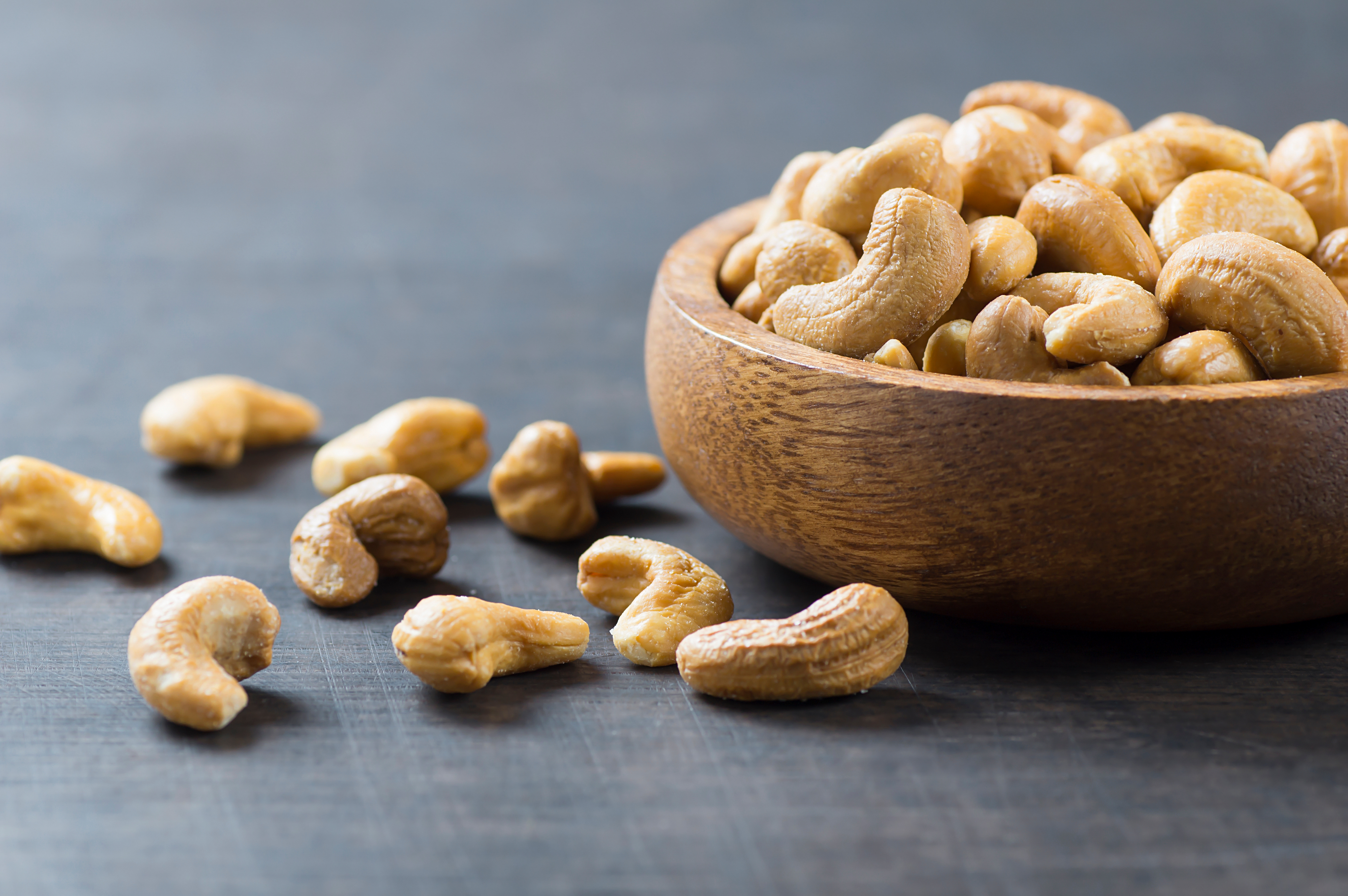 cashew nuts in wooden bowl 