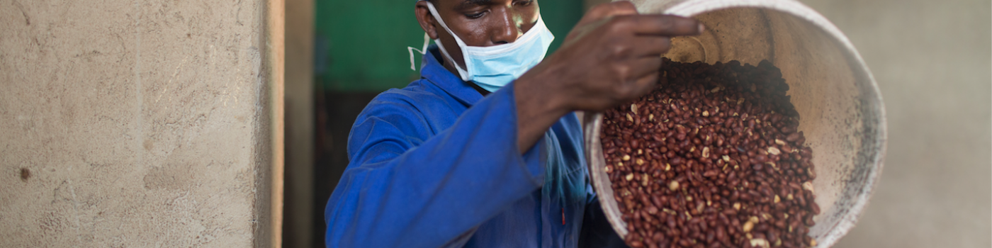 Man roasting peanuts