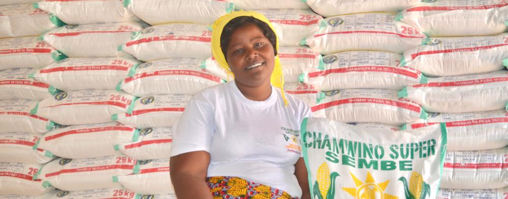Woman in Tanzania with flour bag