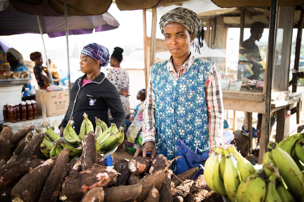 Market women in front of produce