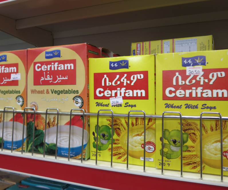 Boxes of maize products on grocery store shelf