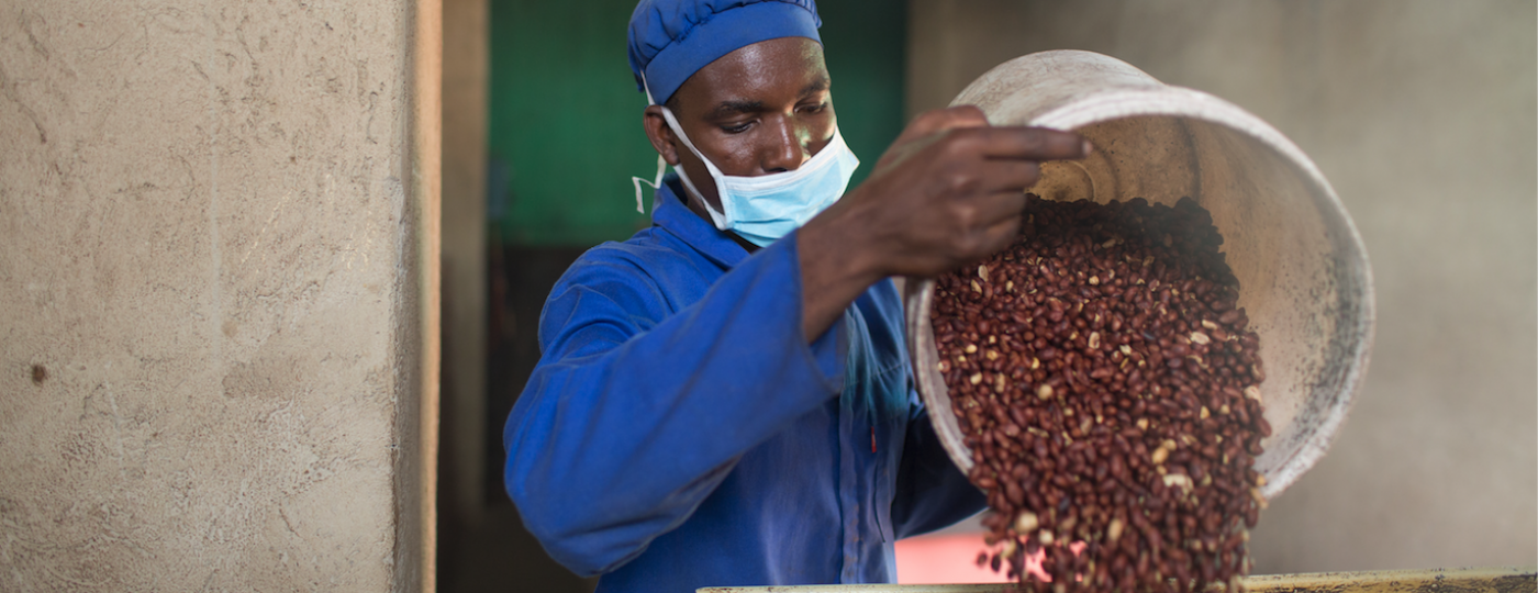 Man roasting peanuts